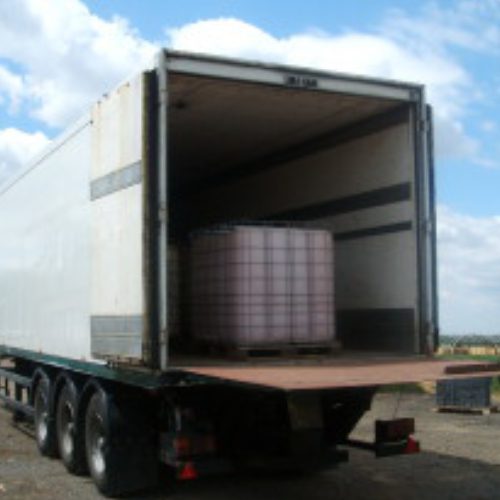 40ft White Box trailer with Taillift and IBC tank on back